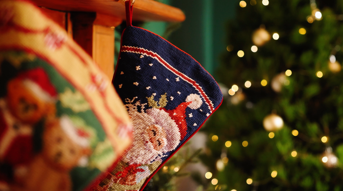 Close up of a Christmas stocking inside Santa’s photo cottage at our South Australia Christmas tree farm, part of our real Christmas tree and Santa photo experience.