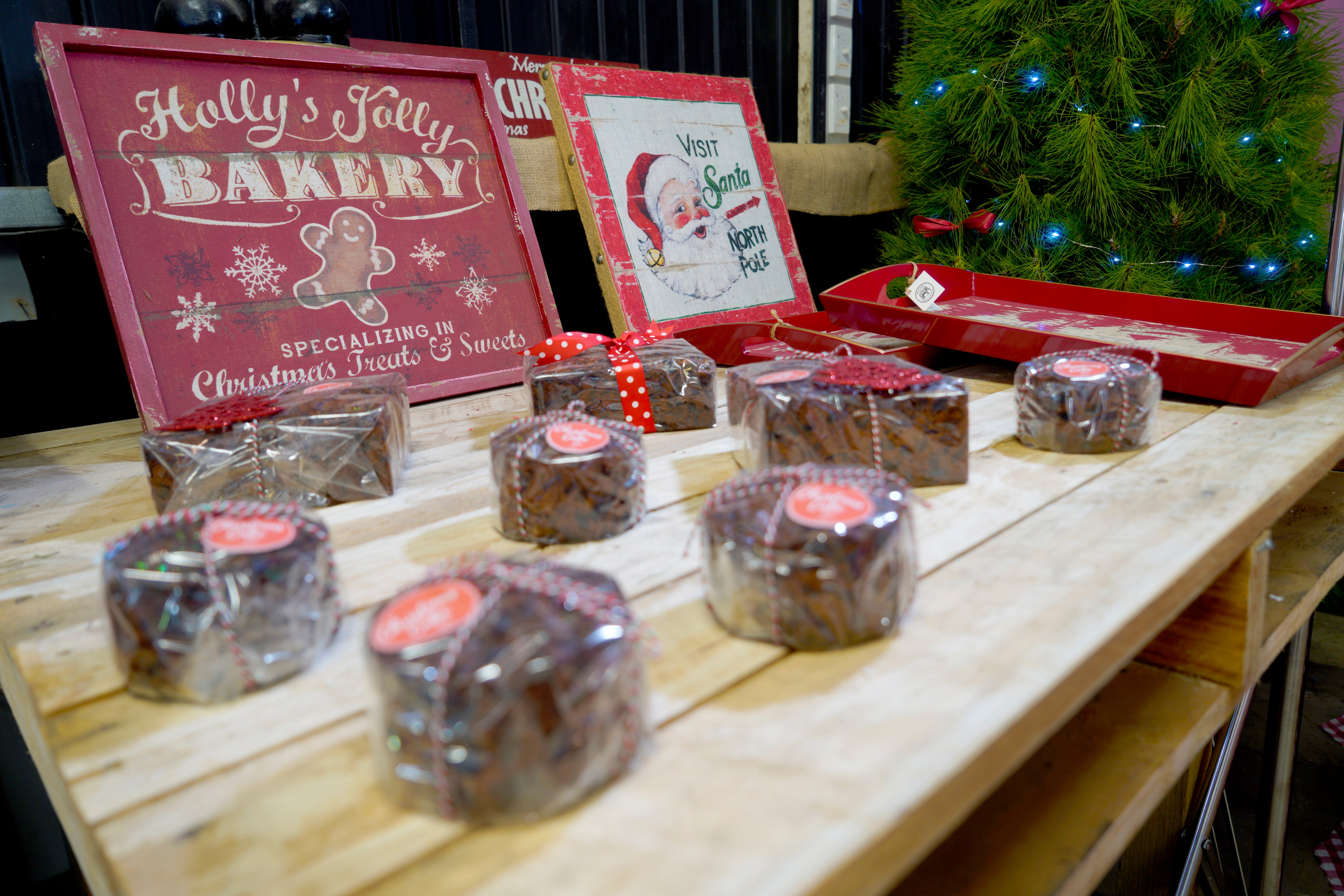 Photo of Christmas decorations, gifts, wreaths, garlands, and festive items displayed in the gift shop at Chandlers Hill Christmas Tree Farm, showcasing the holiday shopping experience and family-friendly festive atmosphere
