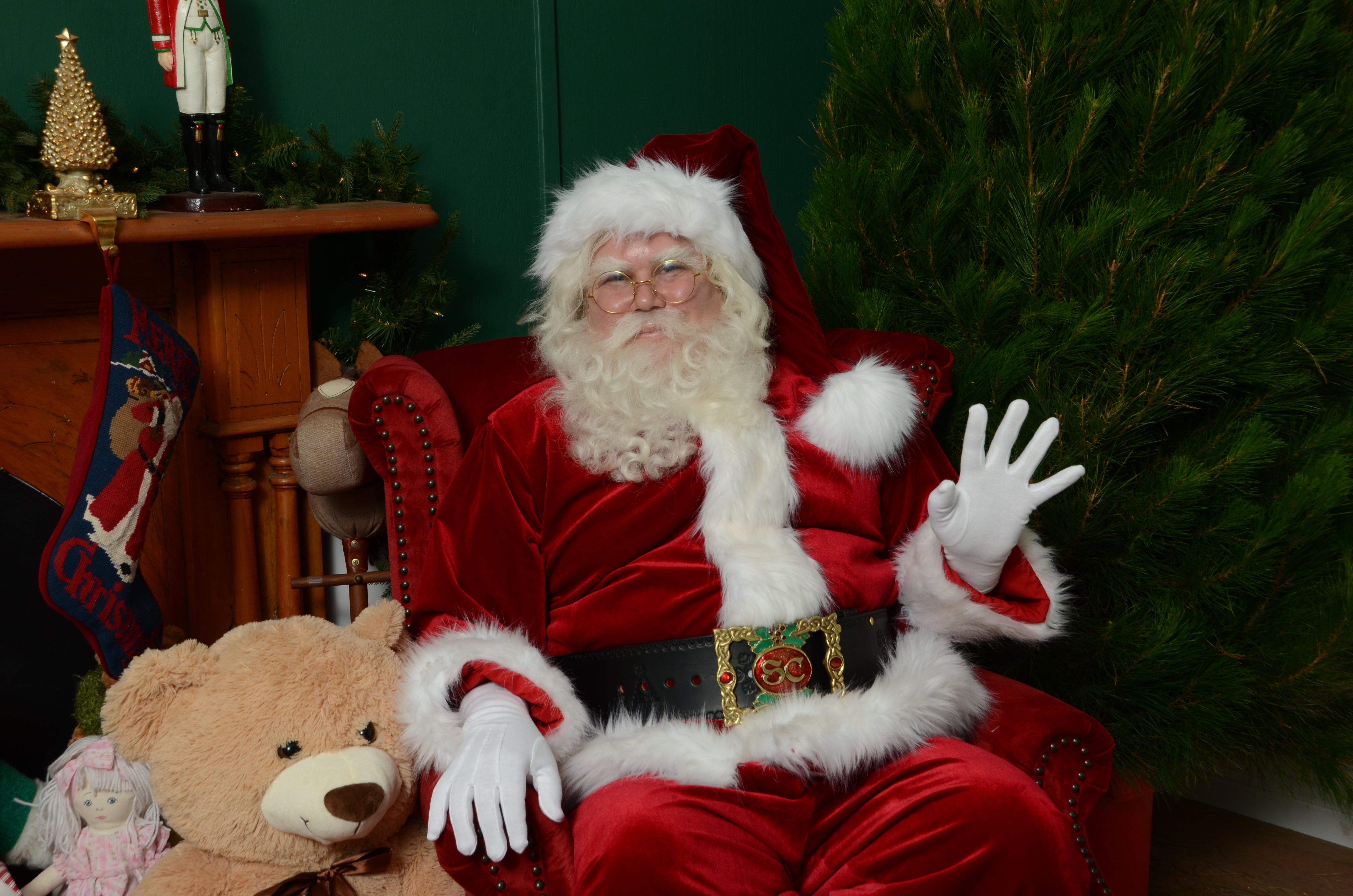 Santa waving in his cottage at our Christmas tree farm Chandlers Hill, Adelaide South Australia! Santa Experience.